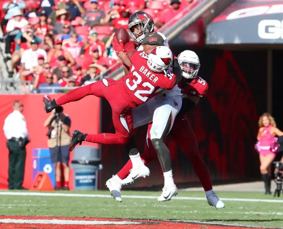 Tampa Bay Buccaneers tight end O.J. Howard (80) tries to make a catch while Arizona Cardinals strong safety Budda Baker (32) tries to break up the pass.