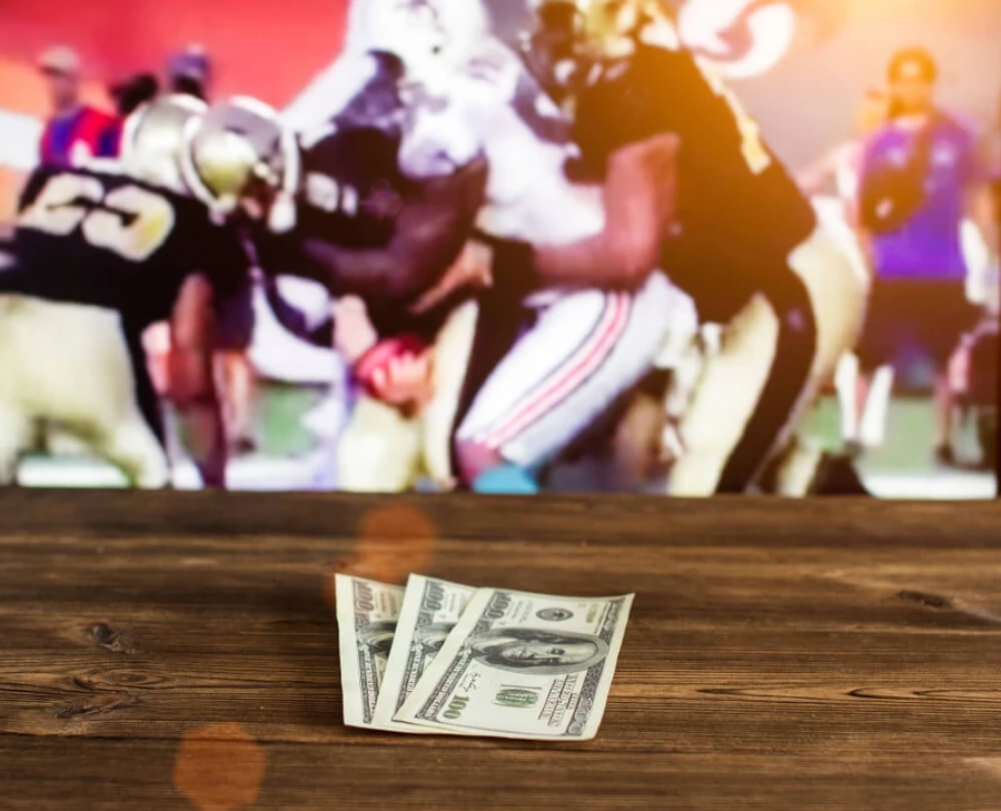 Money on the table while watching NFL
