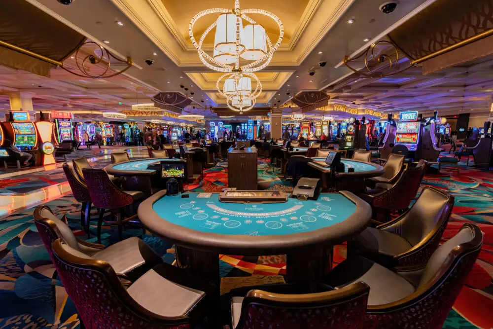 Casino hall with tables and slots